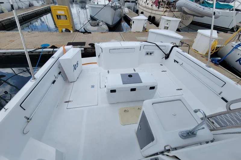 Slide: The Image of Open deck of a 1992 Mediterranean 38 boat docked at a marina. - 10