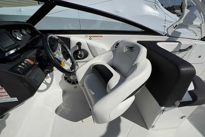 Slide: The Image of Open engine compartment of a 2018 Monterey M65 boat, showcasing interior details. - 12