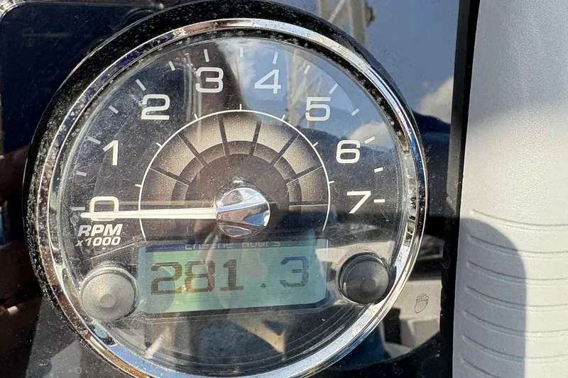 Slide: The Image of Storage compartment in a 2018 Monterey M65 boat with cushions and safety equipment. - 17