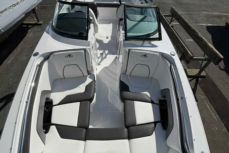 Slide: The Image of Luxurious 2018 Monterey M65 boat interior with white seating and modern design. - 21