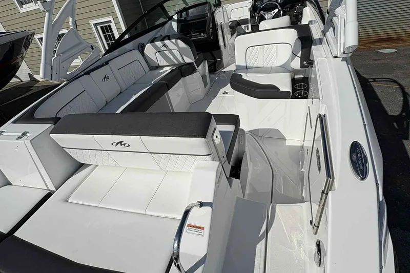 Slide: The Image of Close-up of a 2018 Monterey M65 boat's electrical outlet and warning label. - 23