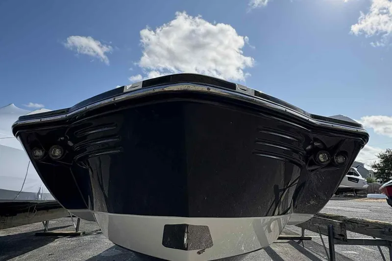 Slide: The Image of 2018 Monterey M65 boat interior with white seating and modern design. - 4