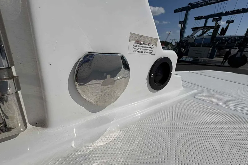 Slide: The Image of Luxurious interior of a 2018 Monterey M65 boat with sleek white seating. - 8