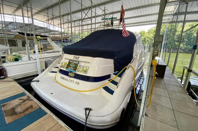 Slide: The Image of 1999 Neptunus 54 Hardtop Express yacht docked, covered, and for sale in Kansas City, MO. - 11