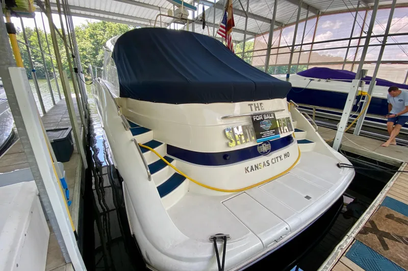 Slide: The Image of 1999 Neptunus 54 Hardtop Express yacht docked, covered, and for sale in Kansas City, MO. - 12