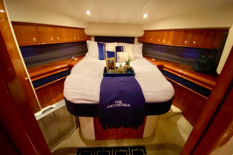 Slide: The Image of Luxurious cabin interior of 1999 Neptunus 54 Hardtop Express yacht. - 49