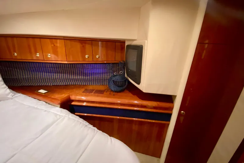 Slide: The Image of Luxurious cabin interior of 1999 Neptunus 54 Hardtop Express yacht. - 50