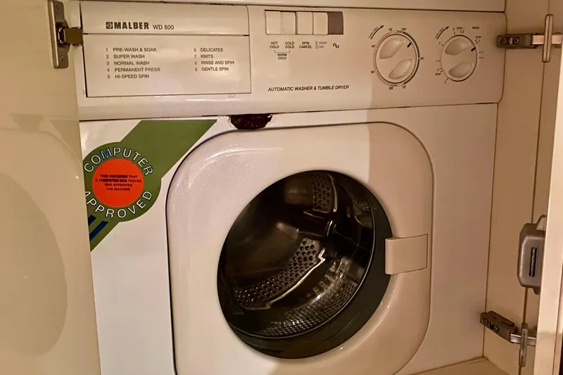 Slide: The Image of Malber WD 800 washer and dryer inside Neptunus 54 Hardtop Express yacht, 1999 model. - 62
