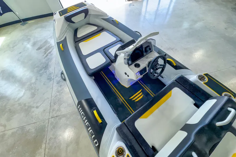 Slide: The Image of 2025 Highfield Velox 420 boat interior with modern design and sleek seating. - 6
