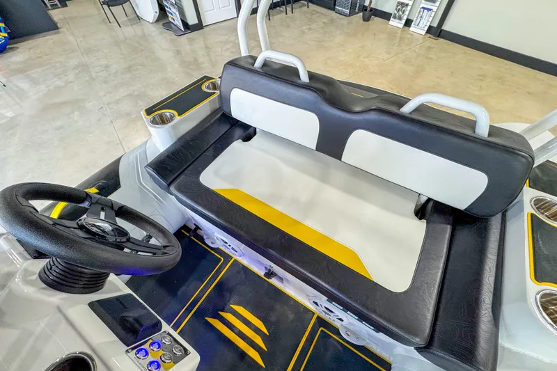 Slide: The Image of Interior of 2025 Highfield Velox 420 boat with steering wheel and seating. - 7