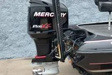 Slide: The Image of 2015 Triton 21 TrX boat with Mercury Pro XS outboard motor. - 12