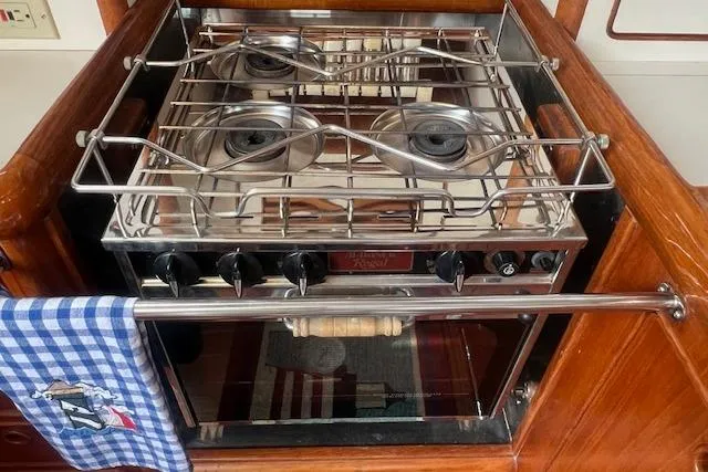 Slide: The Image of Stainless steel stove in 1986 Little Harbor AFt Cockpit K/CB Sloop yacht kitchen. - 13