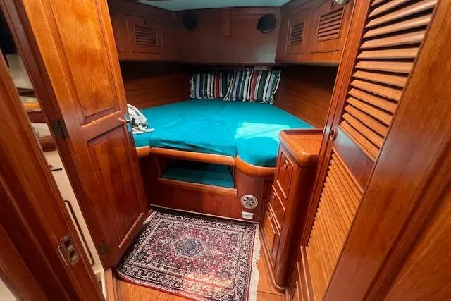 Slide: The Image of Cozy cabin interior of 1986 Little Harbor Aft Cockpit K/CB Sloop with wooden finish. - 14