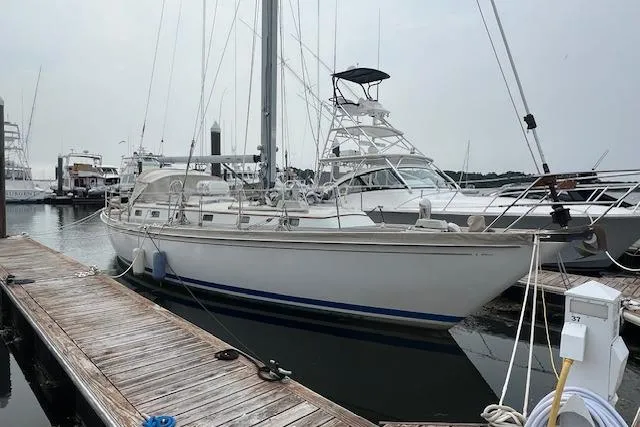 Slide: The Image of 1986 Little Harbor AFt Cockpit K/CB Sloop docked at marina. - 2