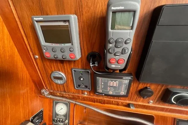 Slide: The Image of Control panel of 1986 Little Harbor AFt Cockpit K/CB Sloop with navigation instruments. - 25