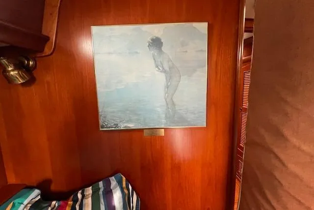Slide: The Image of Wood-paneled interior of 1986 Little Harbor AFt Cockpit K/CB Sloop with framed artwork. - 27