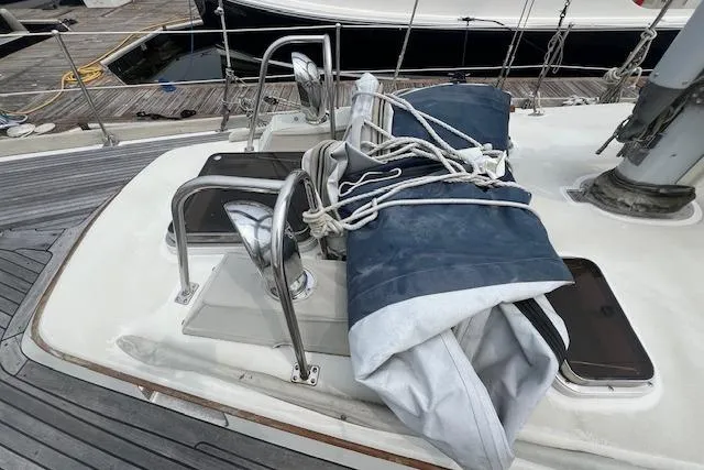 Slide: The Image of 1986 Little Harbor Aft Cockpit Sloop deck with sail and winch. - 35