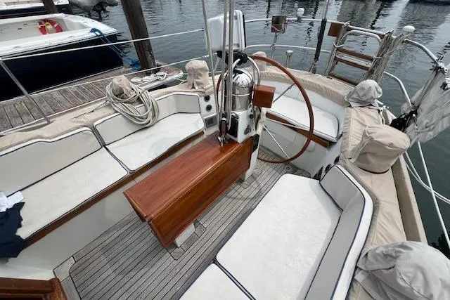 Slide: The Image of 1986 Little Harbor AFt Cockpit K/CB Sloop with wooden deck and seating area. - 37