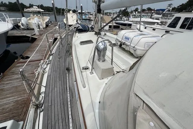 Slide: The Image of 1986 Little Harbor AFt Cockpit K/CB Sloop docked, showcasing deck and rigging details. - 39