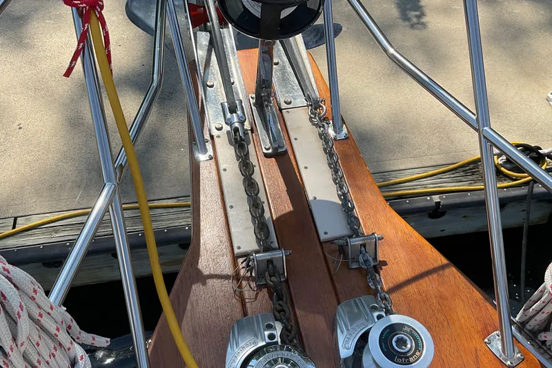 Slide: The Image of Bow of 2001 Island Packet 420 sailboat with anchor chains and winches. - 37
