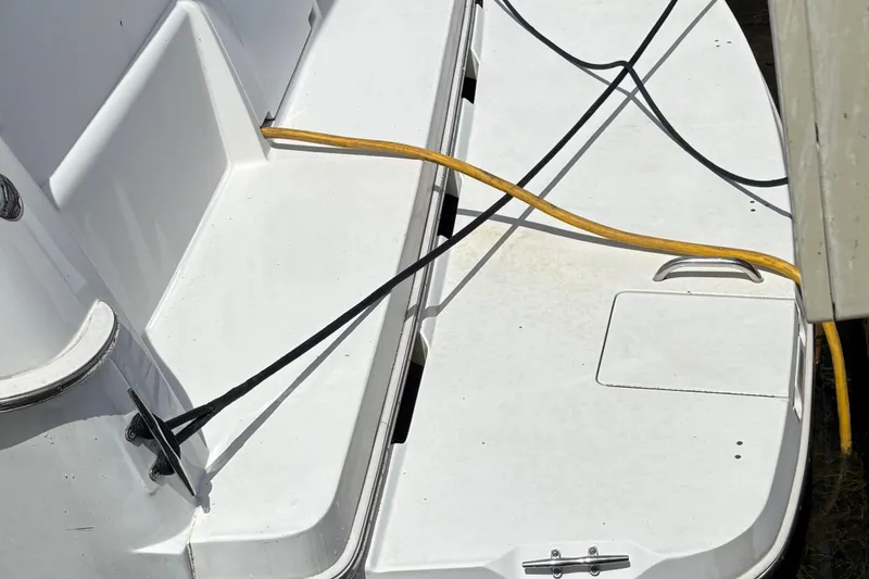 Slide: The Image of 1999 Silverton 392 boat deck with yellow and black cables. - 34