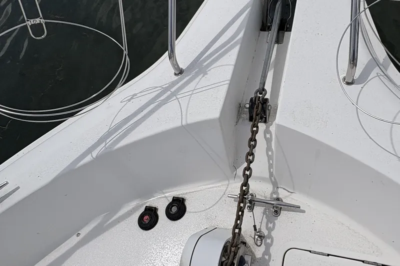 Slide: The Image of 1999 Silverton 392 boat deck with anchor chain and railing details. - 36