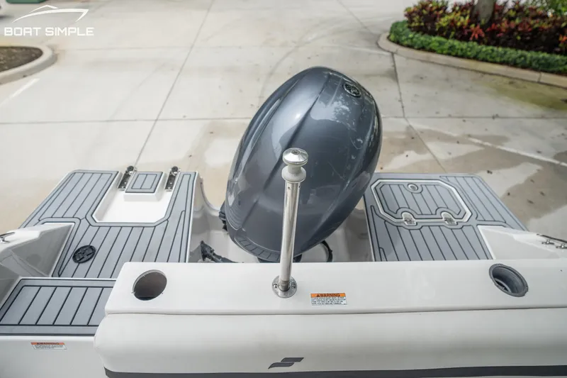 Slide: The Image of 2024 Starcraft SVX 191 OB boat with sleek outboard motor and modern deck design. - 15