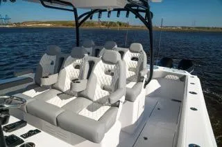 Slide: The Image of 2026 Front Runner 37 Catamaran with luxurious seating on open water. - 8
