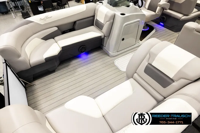 Slide: The Image of Luxurious interior of 2023 SunChaser 23 Eclipse SSB pontoon boat with plush seating. - 11