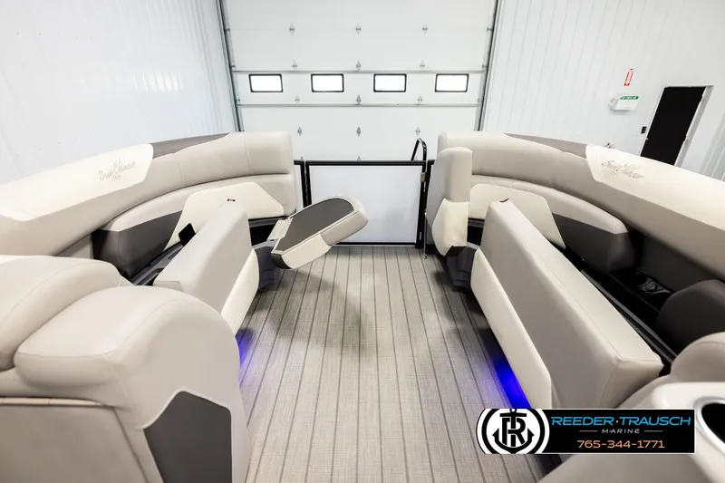 Slide: The Image of 2023 SunChaser 23 Eclipse SSB pontoon boat interior with plush seating and modern design. - 20
