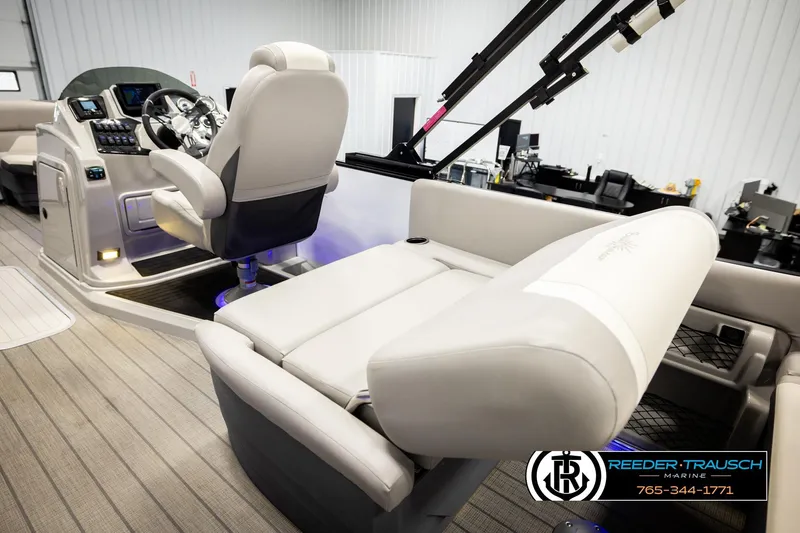 Slide: The Image of Interior of 2023 SunChaser 23 Eclipse SSB boat with modern helm and seating. - 24