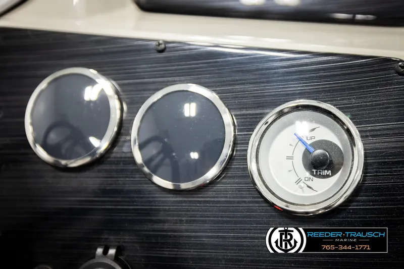 Slide: The Image of Dashboard of 2023 SunChaser 23 Eclipse SSB boat with trim gauge and logo. - 39