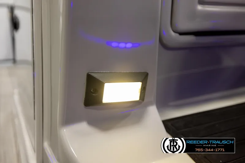 Slide: The Image of Close-up of 2023 SunChaser 23 Eclipse SSB boat light with Reeder-Trausch Marine logo. - 42