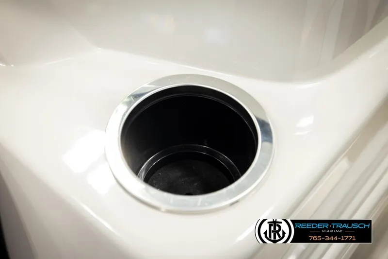 Slide: The Image of Cup holder on 2023 SunChaser 23 Eclipse SSB boat, Reeder-Trausch Marine logo visible. - 45