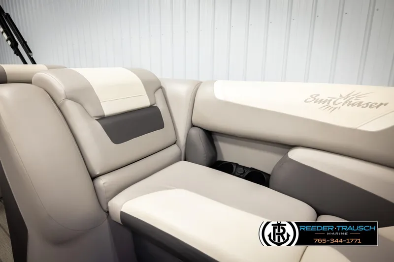 Slide: The Image of 2023 SunChaser 23 Eclipse SSB boat interior with beige and gray seating. - 49
