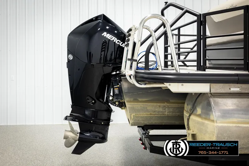 Slide: The Image of 2023 SunChaser 23 Eclipse SSB with Mercury outboard motor in showroom. - 50