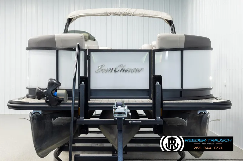 Slide: The Image of 2023 SunChaser 23 Eclipse SSB pontoon boat on display in a showroom. - 9