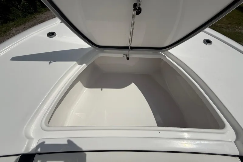 Slide: The Image of Open storage compartment on 2026 Tidewater 2500 Carolina Bay boat. - 43