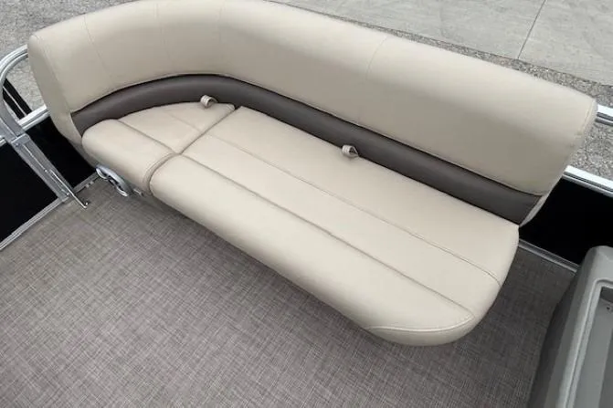 Slide: The Image of 2024 Sun Tracker Party Barge 16 DLX beige seating, spacious and comfortable design. - 7