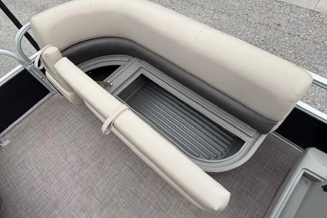 Slide: The Image of 2024 Sun Tracker Party Barge 16 DLX seating with storage compartment. - 8