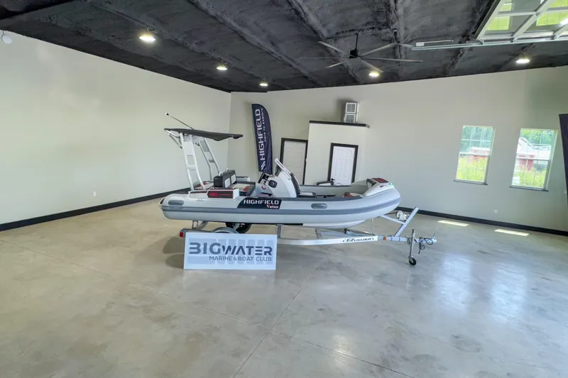 Slide: The Image of 2025 Highfield Velox 420 boat displayed indoors at Bigwater Marine & Boat Club. - 21