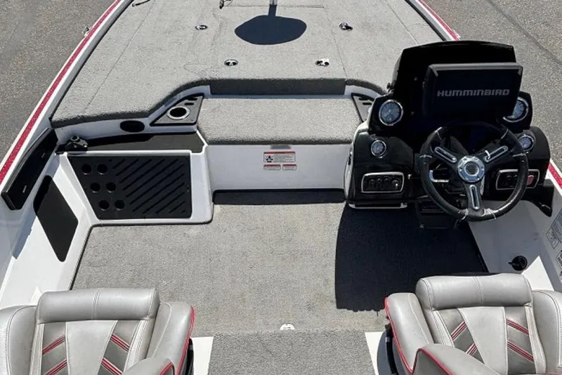 Slide: The Image of 2019 Nitro Z18 boat interior with steering wheel and seating, featuring Humminbird electronics. - 4