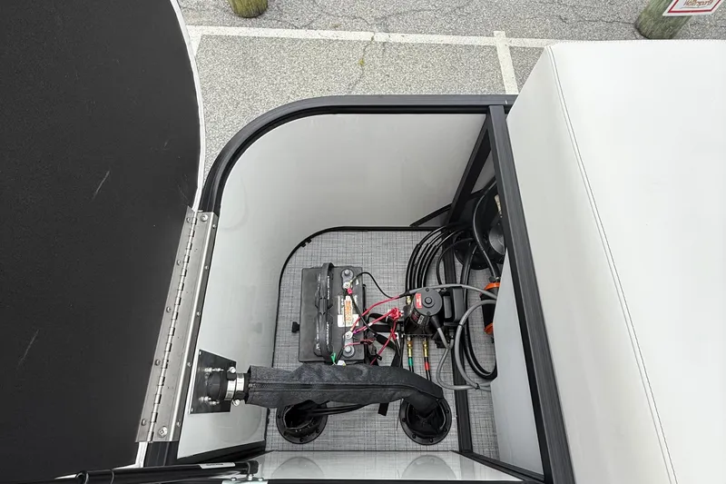 Slide: The Image of Battery compartment of 2026 Berkshire 23CL STS 2.75 with wiring and components. - 11