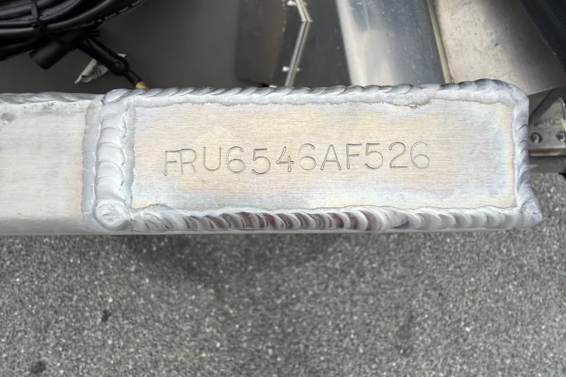 Slide: The Image of Close-up of a welded metal part with serial number FRU6546AF526, Berkshire 23CL STS 2.75, 2026. - 15