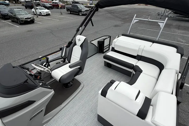 Slide: The Image of 2026 Berkshire 23CL STS 2.75 pontoon boat interior with modern seating and helm. - 9
