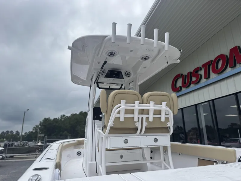 Slide: The Image of 2026 Sportsman Masters 247OE Bay Boat with dual seats and overhead rod holders. - 28