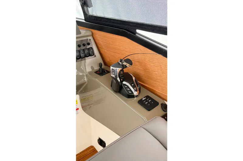 Slide: The Image of 2026 Cutwater C-248 Coupe helm with joystick controls and modern dashboard design. - 29