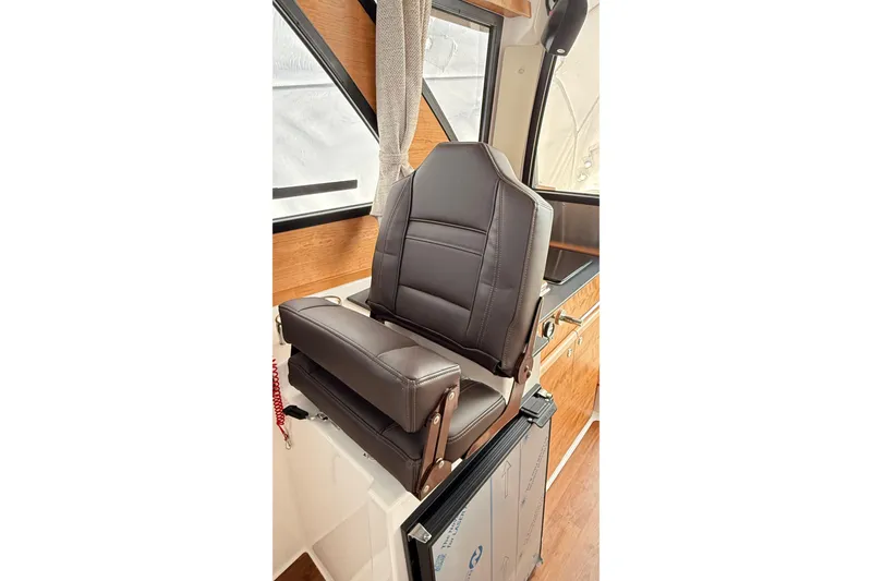 Slide: The Image of 2026 Cutwater C-248 Coupe interior with luxurious brown leather seating. - 32