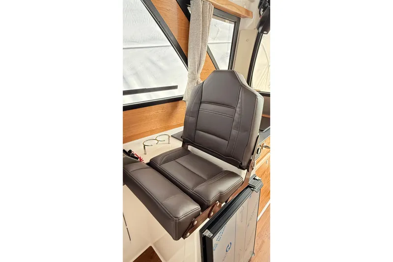 Slide: The Image of 2026 Cutwater C-248 Coupe interior with luxurious brown leather seating. - 33