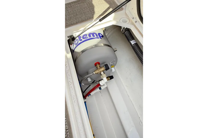 Slide: The Image of 2026 Cutwater C-248 Coupe interior showing a water heater system installation. - 54